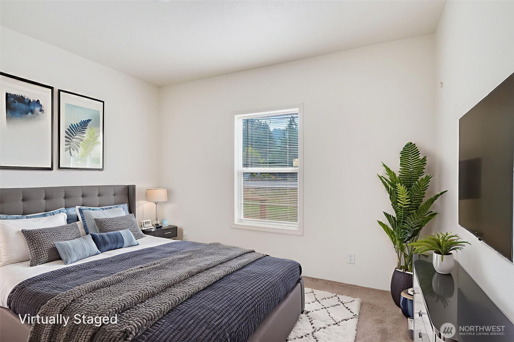 4322 Ocean Beach Highway Longview, WA 98632 - Photo 25 of 40 a bedroom with a potted plant and a window