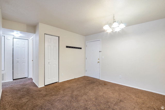 290 North 500 West, Unit 211 Bountiful, UT 84010 - Photo 3 of 21 Entry Door Leading into Semi-Formal Dining Room