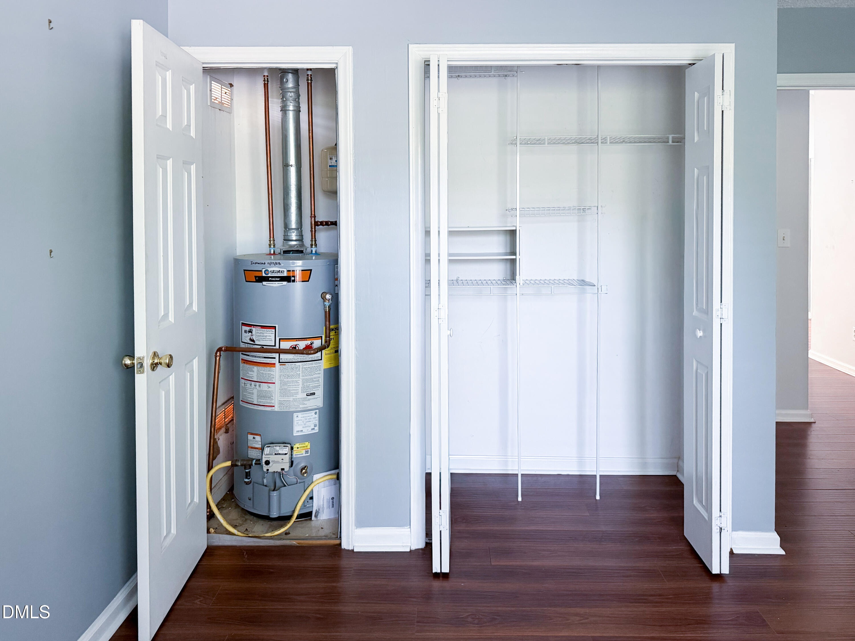 6304 Forest Ridge Drive Durham, NC 27713 - Photo 13 of 29 a view of a room with wooden floor and closet