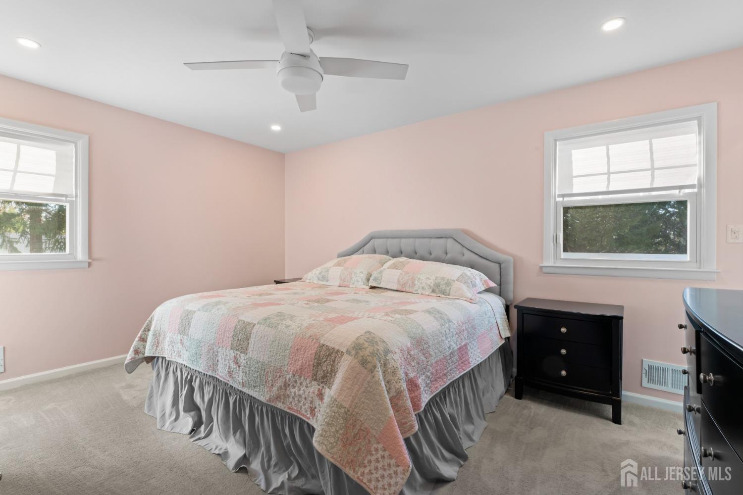 4 Whitman Road Morganville, NJ 07751 - Photo 19 of 45 a bedroom with a bed and a tv