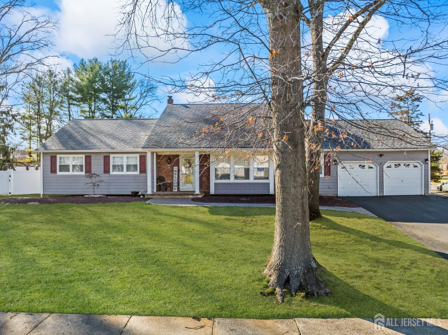 4 Whitman Road Morganville, NJ 07751 - Photo 2 of 45 a view of a house with a yard