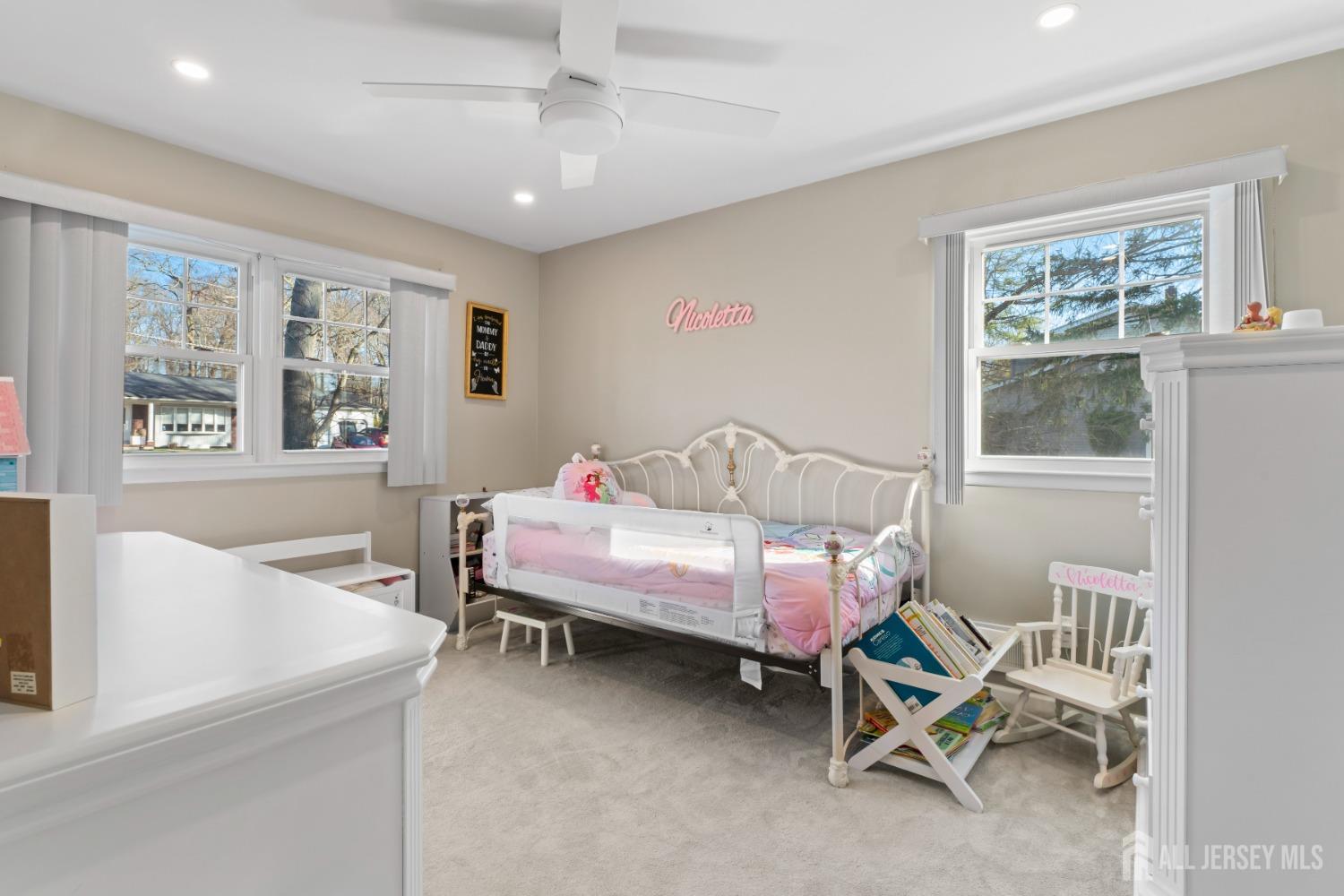 4 Whitman Road Morganville, NJ 07751 - Photo 22 of 45 a bedroom with furniture and a window