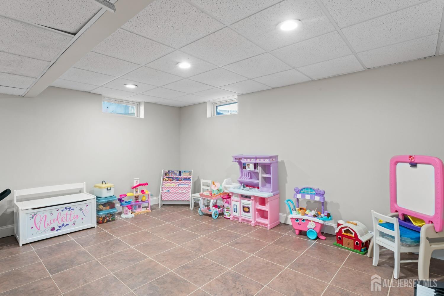4 Whitman Road Morganville, NJ 07751 - Photo 29 of 45 a room with toys and toys