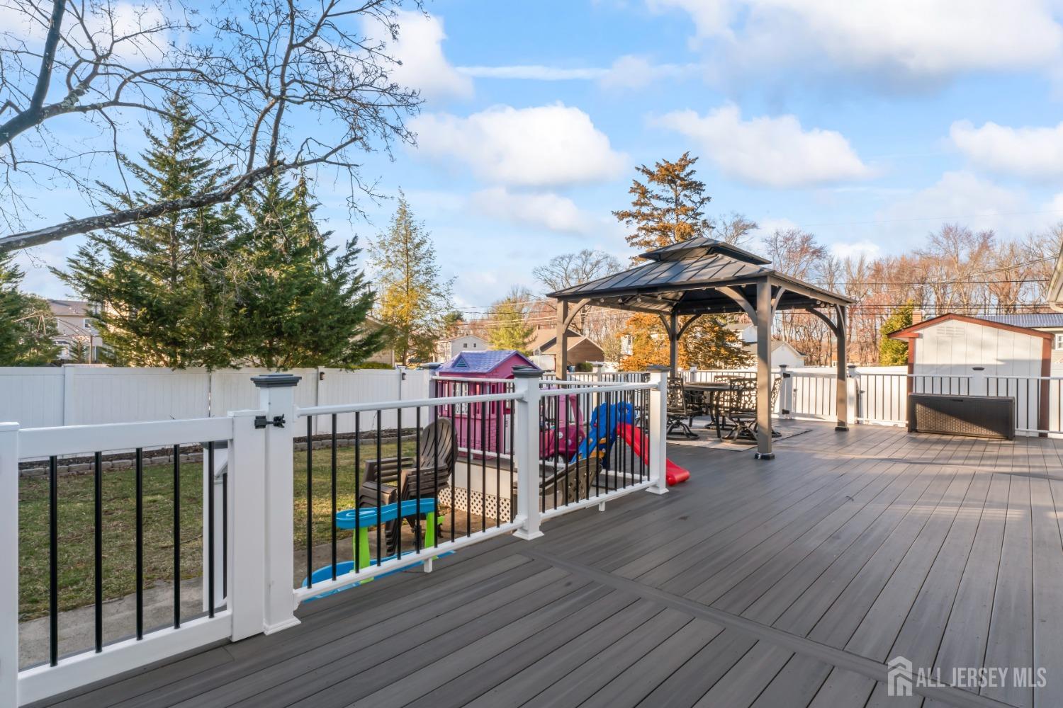 4 Whitman Road Morganville, NJ 07751 - Photo 30 of 45 a view of a roof deck