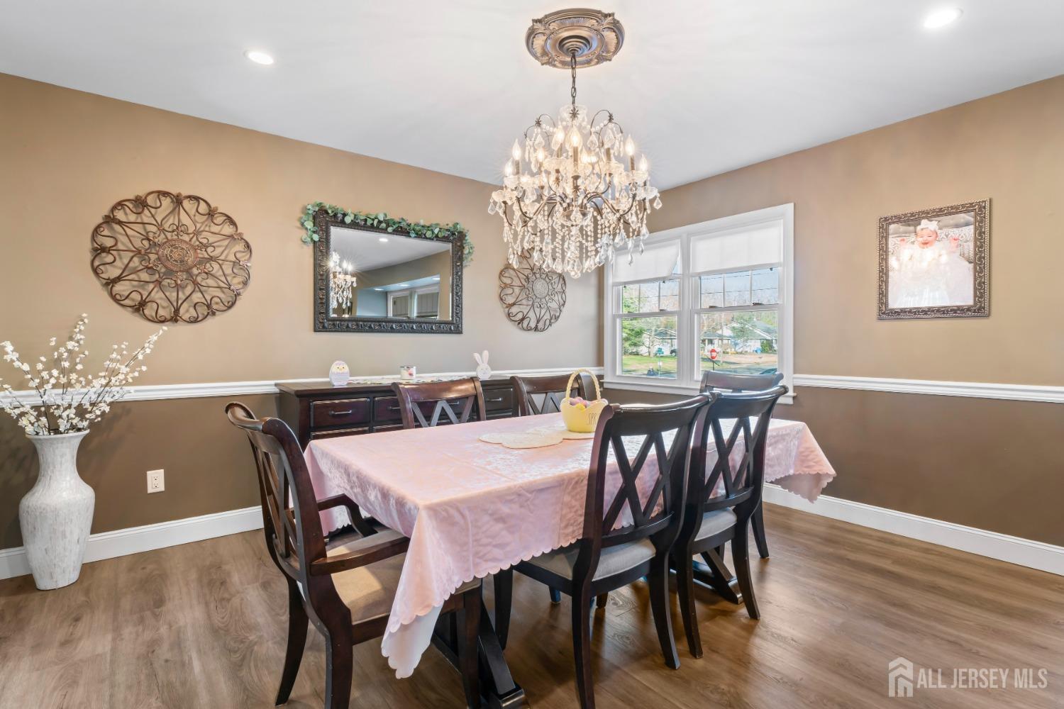 4 Whitman Road Morganville, NJ 07751 - Photo 8 of 45 a view of a dining room with furniture window and wooden floor