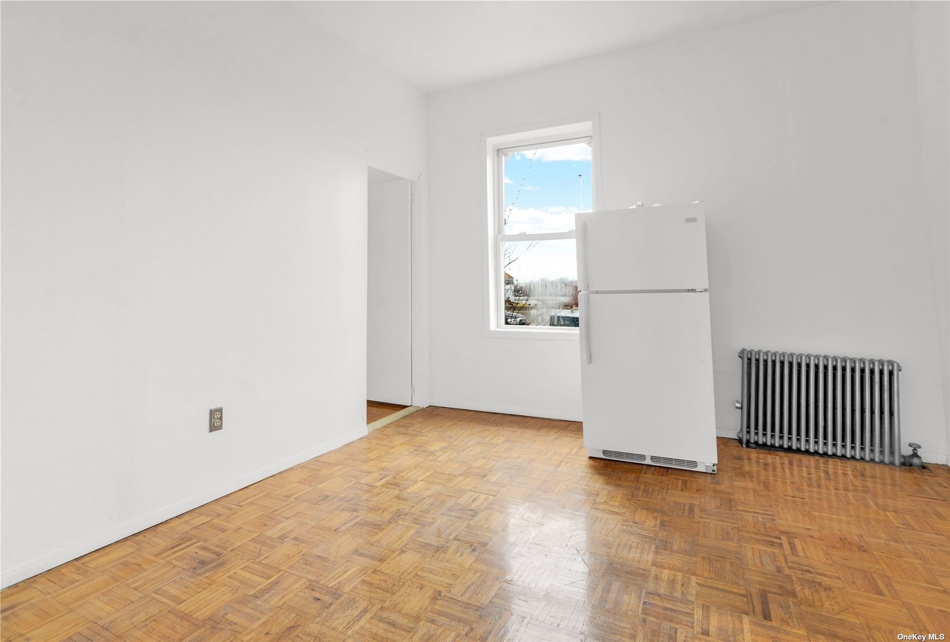 695 Meeker Avenue, Unit 6 Brooklyn, NY 11222 - Photo 6 of 17 an empty room with windows