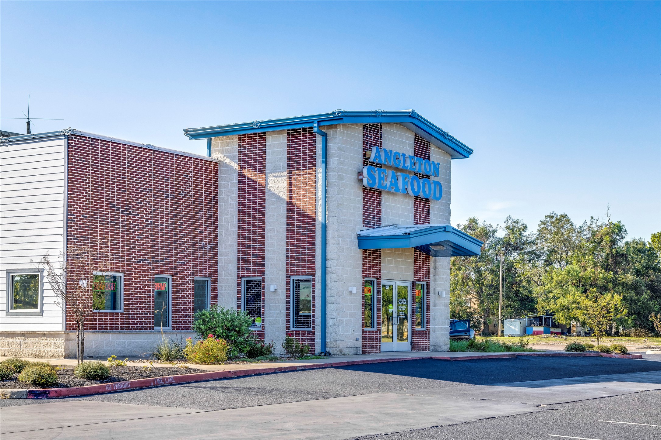 200 Bennett Street Angleton, TX 77515 - Photo 15 of 28 a view of a building with a street