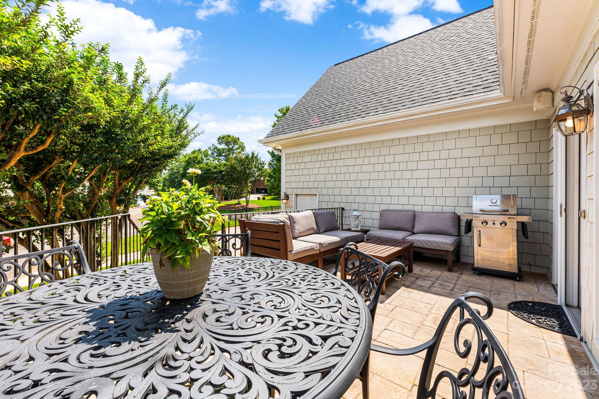 17318 Players Ridge Drive Cornelius, NC 28031 - Photo 39 of 48 a view of a patio with couple of chairs
