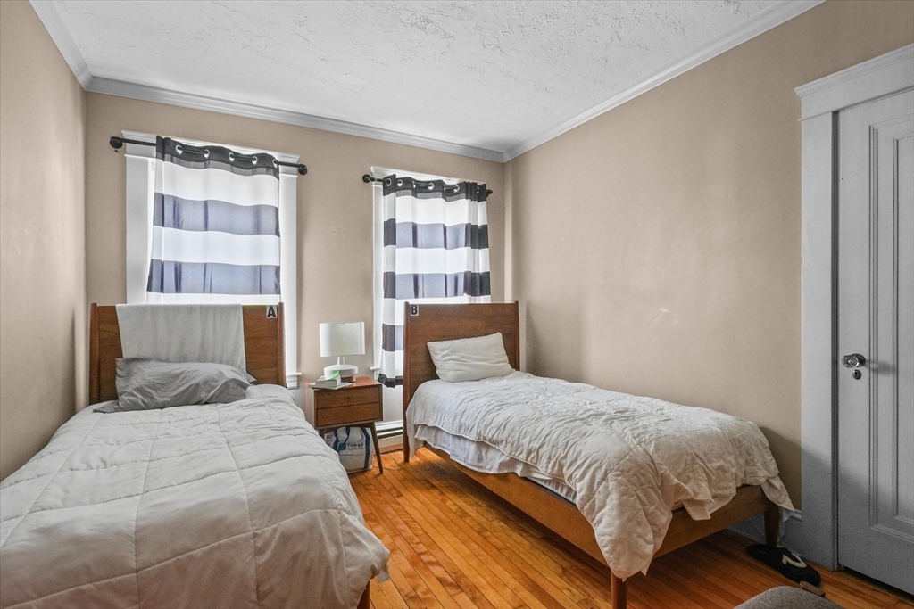 37-39 South Main Street Millbury, MA 01527 - Photo 12 of 42 a bedroom with two beds and a window