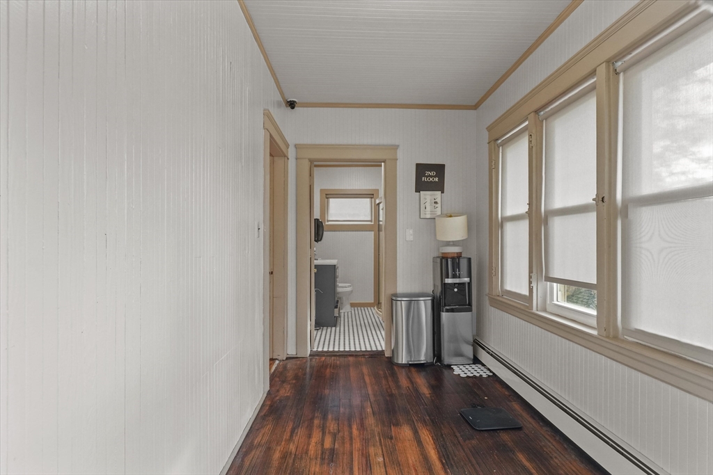 37-39 South Main Street Millbury, MA 01527 - Photo 19 of 42 a view of empty room with wooden floor and fan
