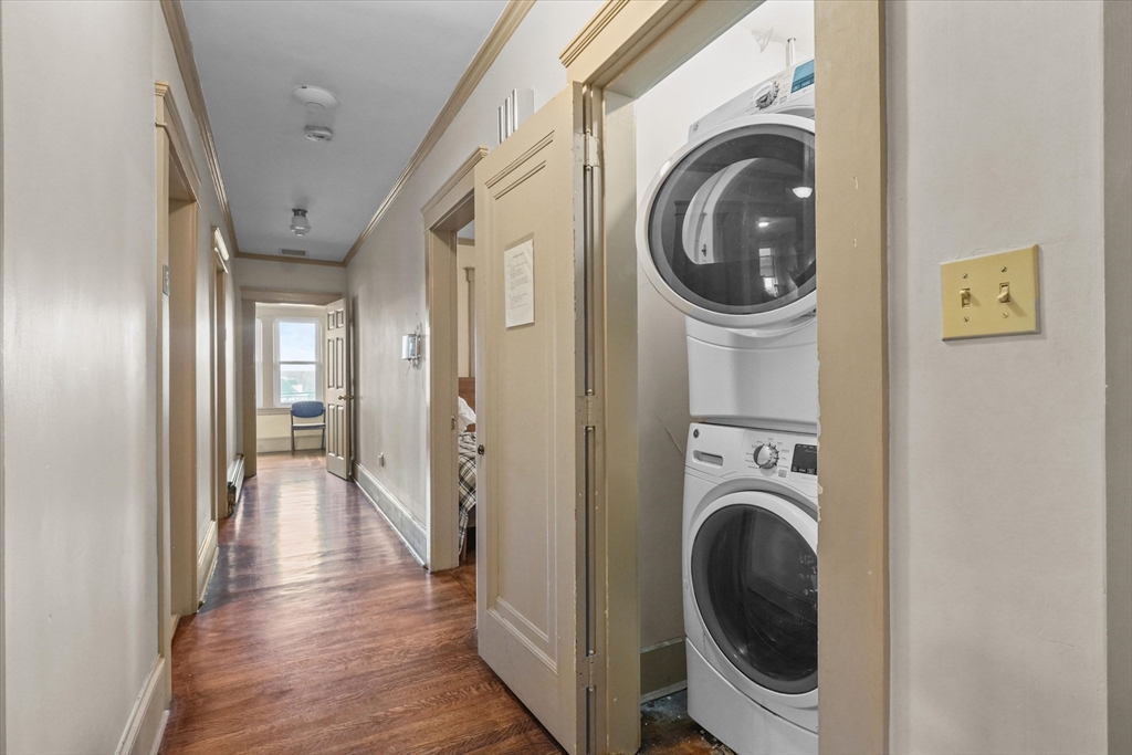 37-39 South Main Street Millbury, MA 01527 - Photo 28 of 42 a view of a hallway with washer and dryer