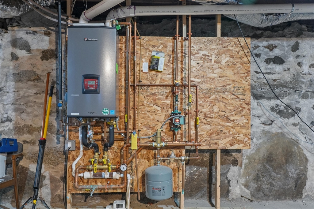 37-39 South Main Street Millbury, MA 01527 - Photo 38 of 42 a balcony with table and chairs