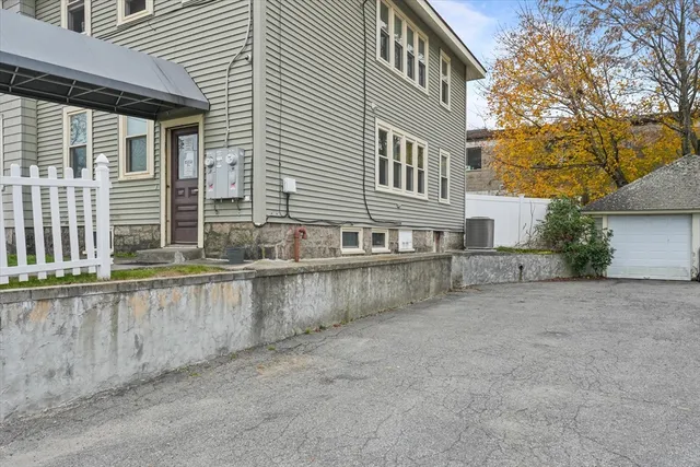 a view of a house with a street