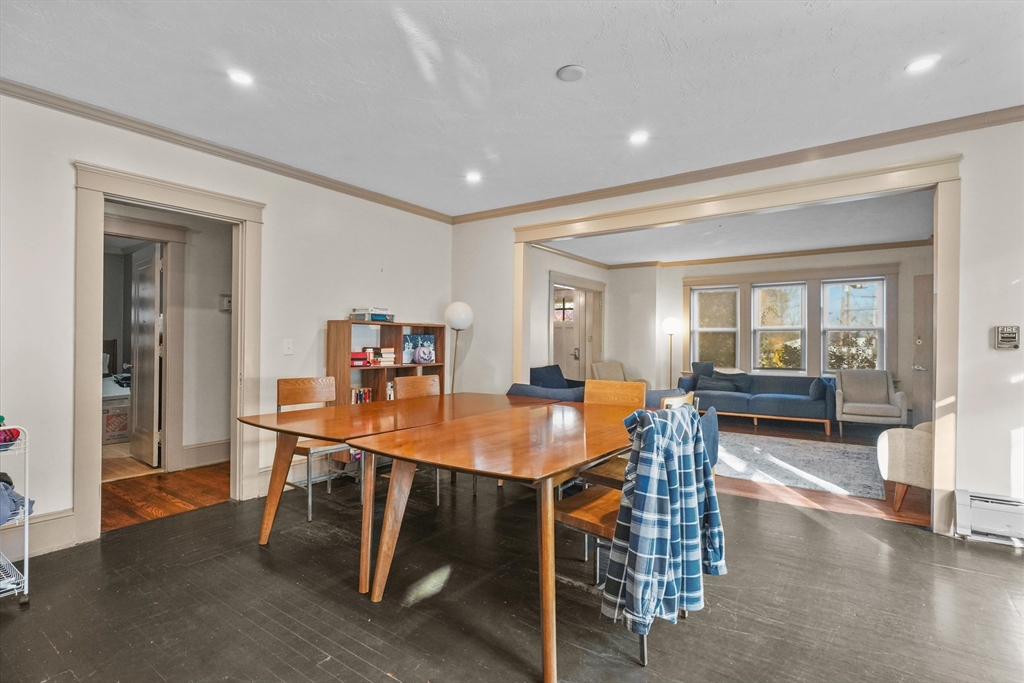 37-39 South Main Street Millbury, MA 01527 - Photo 6 of 42 a view of a dining room with furniture and wooden floor