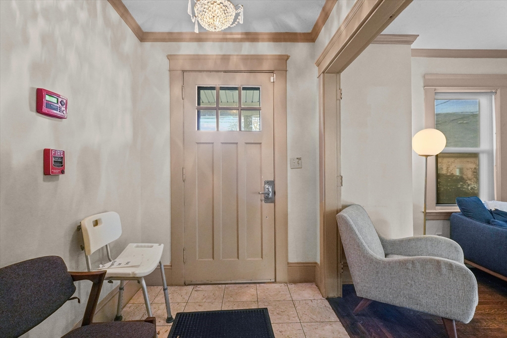 37-39 South Main Street Millbury, MA 01527 - Photo 10 of 42 a view of a livingroom with furniture and a window