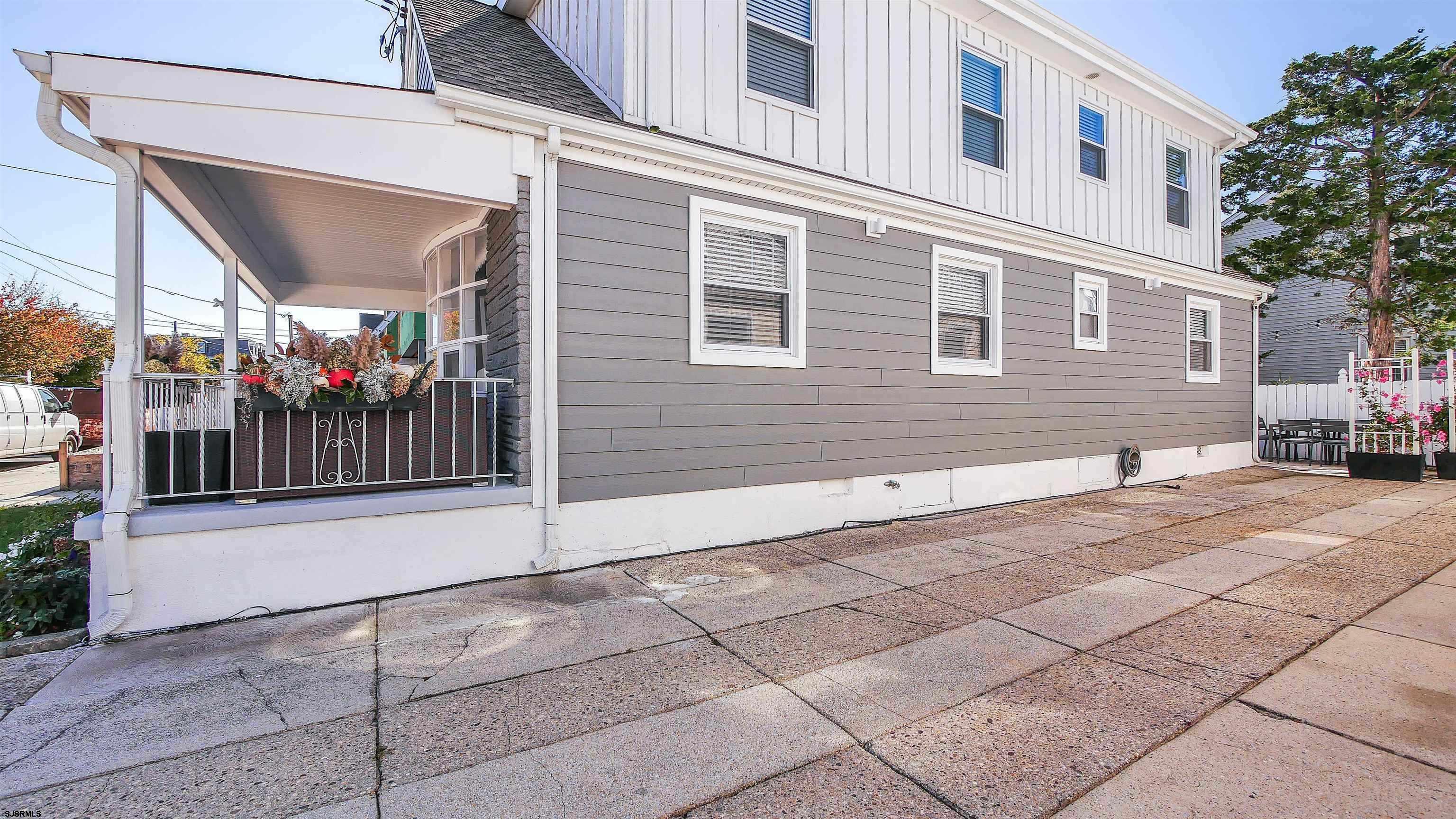 12 North Delavan Avenue, Unit AUGUST 1ST LABOR DAY 2026 Margate City, NJ 08402 - Photo 36 of 41 a view of a house with a street