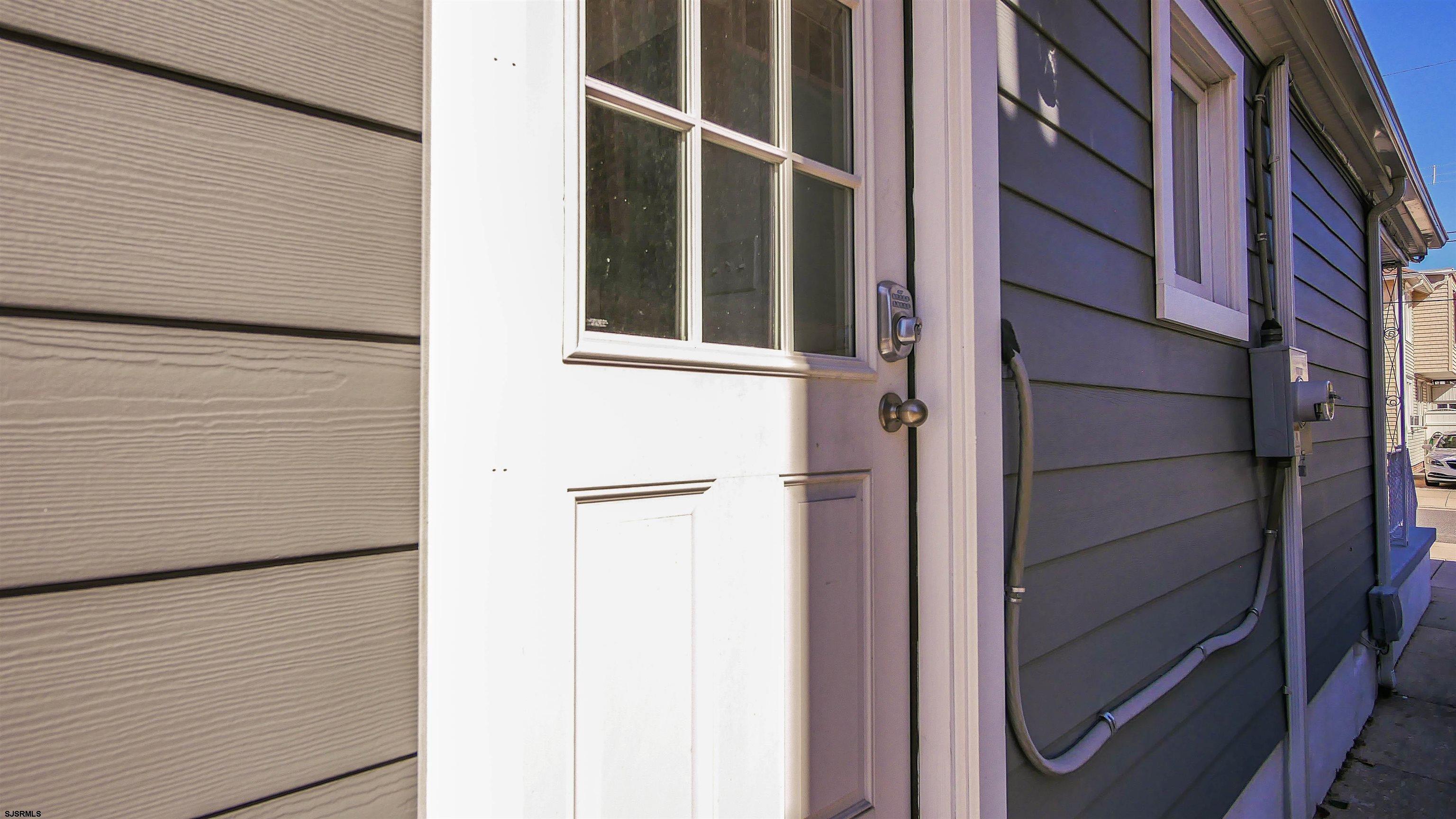 12 North Delavan Avenue, Unit AUGUST 1ST LABOR DAY 2026 Margate City, NJ 08402 - Photo 41 of 41 a view of front door