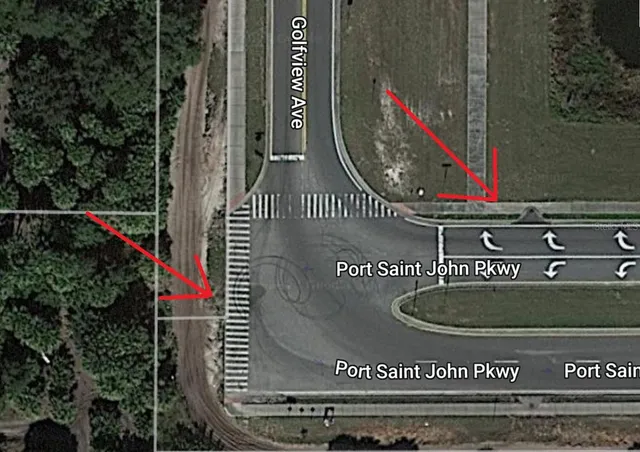 a view of a pathway both side of a yard