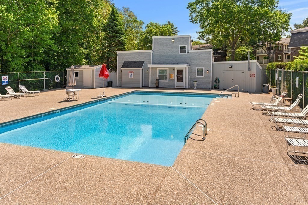 51 Will Drive, Unit 127 Canton, MA 02021 - Photo 14 of 15 a view of a house with swimming pool