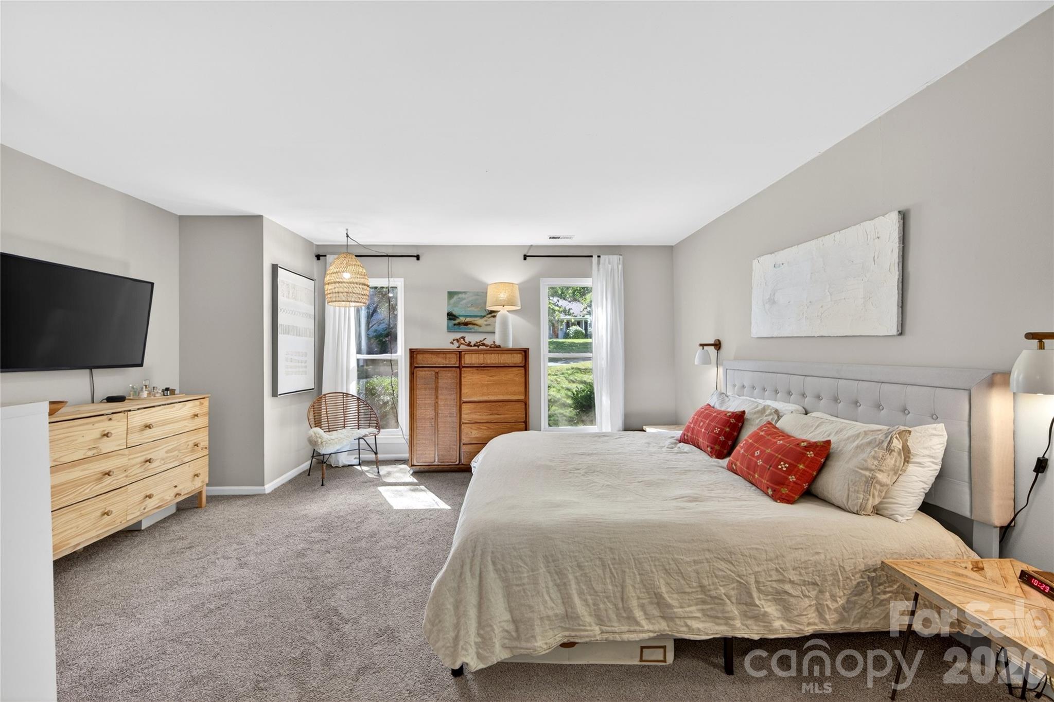 8713 Golf Ridge Drive Charlotte, NC 28277 - Photo 15 of 30 a bedroom with a bed and flat screen tv