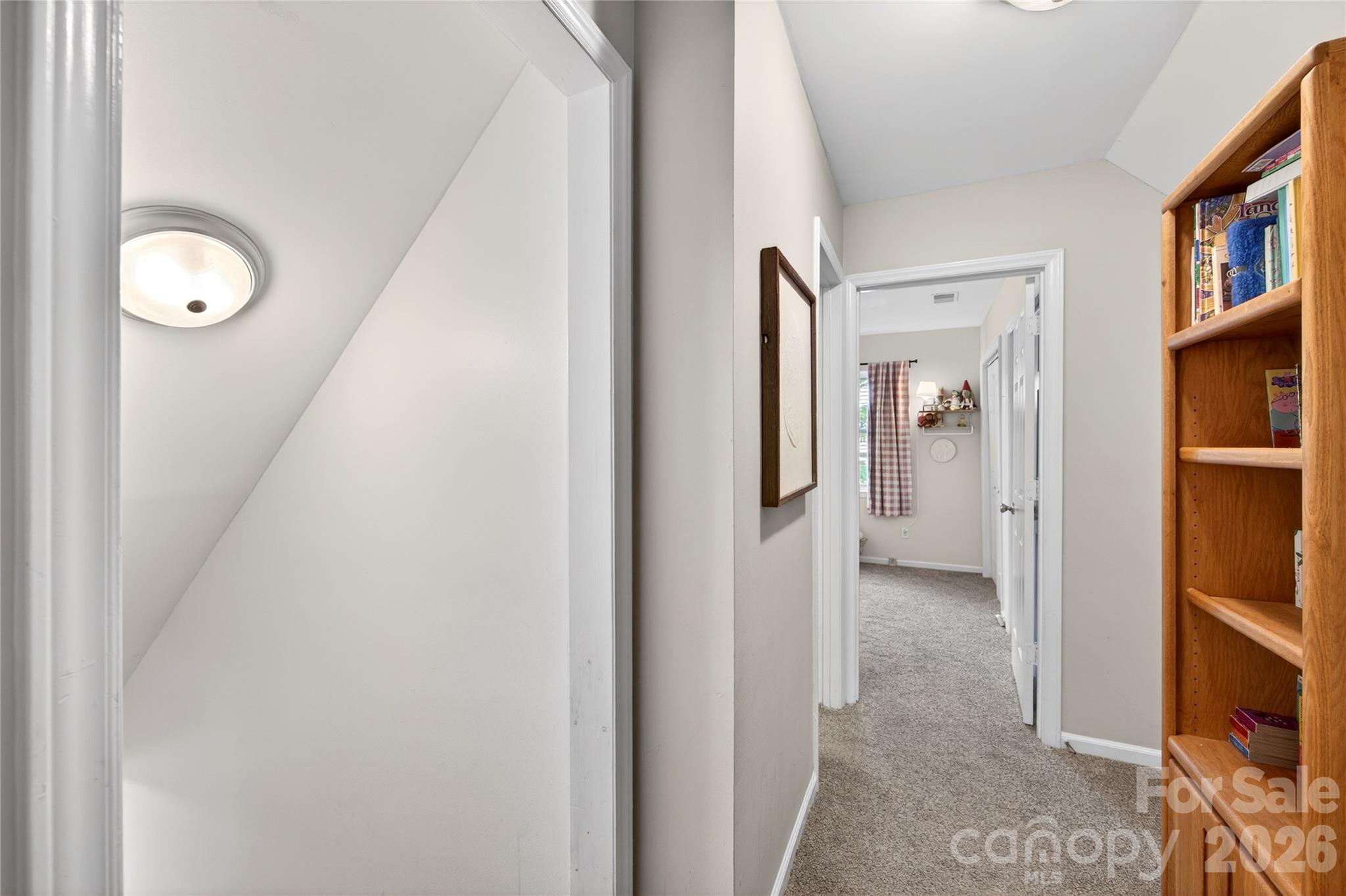 8713 Golf Ridge Drive Charlotte, NC 28277 - Photo 18 of 30 a view of a hallway with wooden floor and entryway