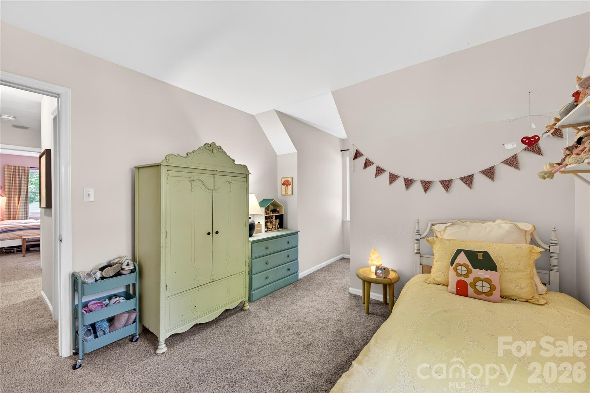 8713 Golf Ridge Drive Charlotte, NC 28277 - Photo 19 of 30 a bedroom with a bed and a mirror