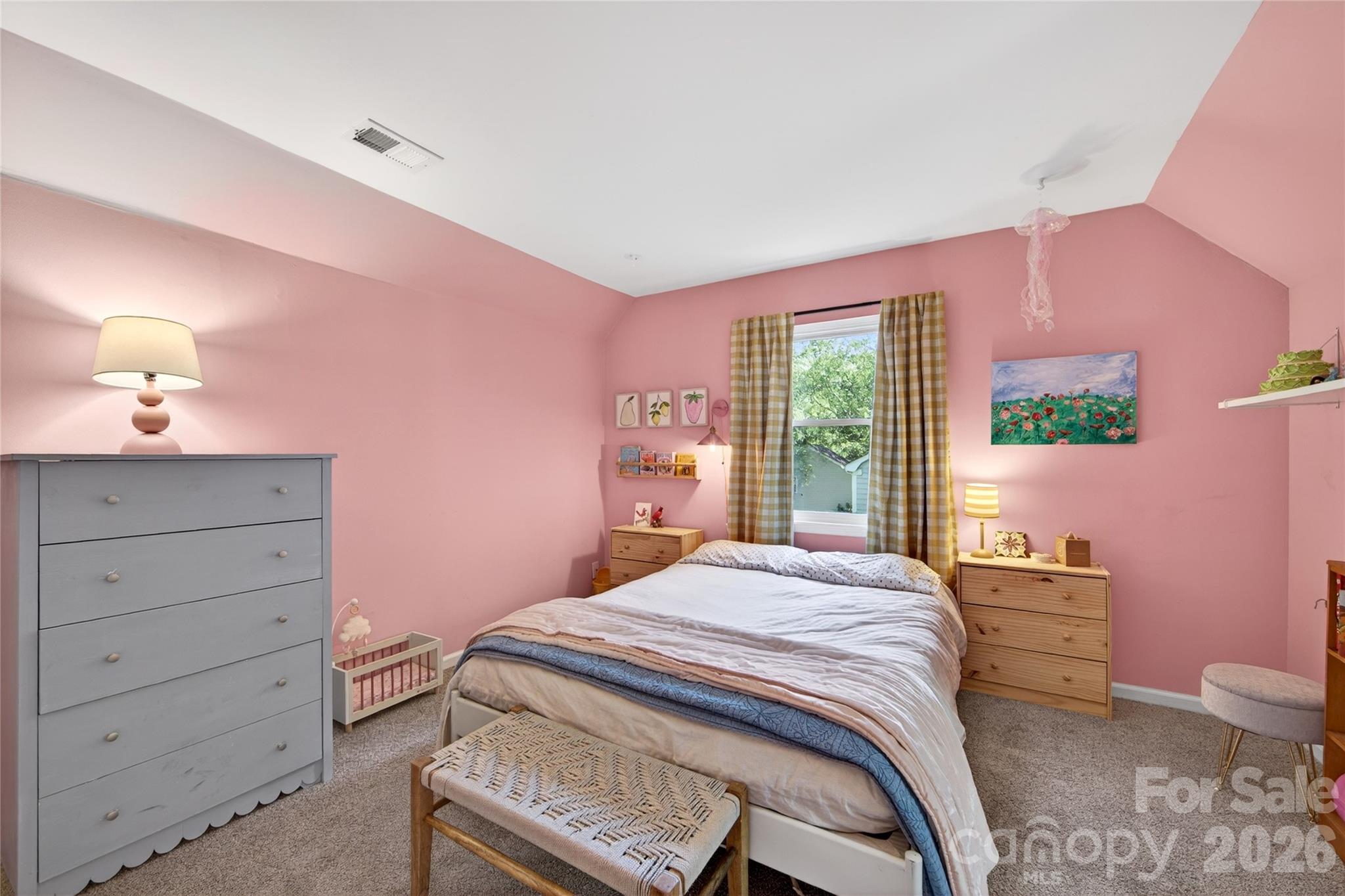 8713 Golf Ridge Drive Charlotte, NC 28277 - Photo 22 of 30 a bedroom with a bed a chandelier and a window