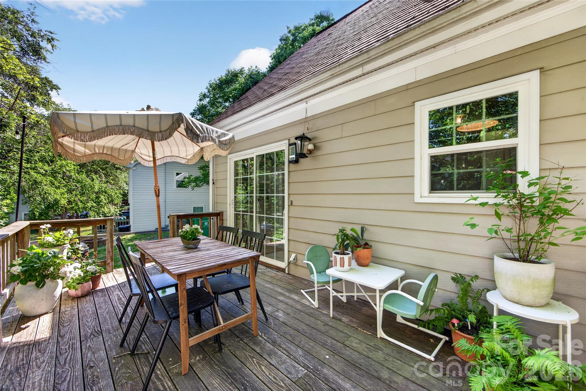 8713 Golf Ridge Drive Charlotte, NC 28277 - Photo 25 of 30 a view of outdoor sitting area with furniture and wooden floor