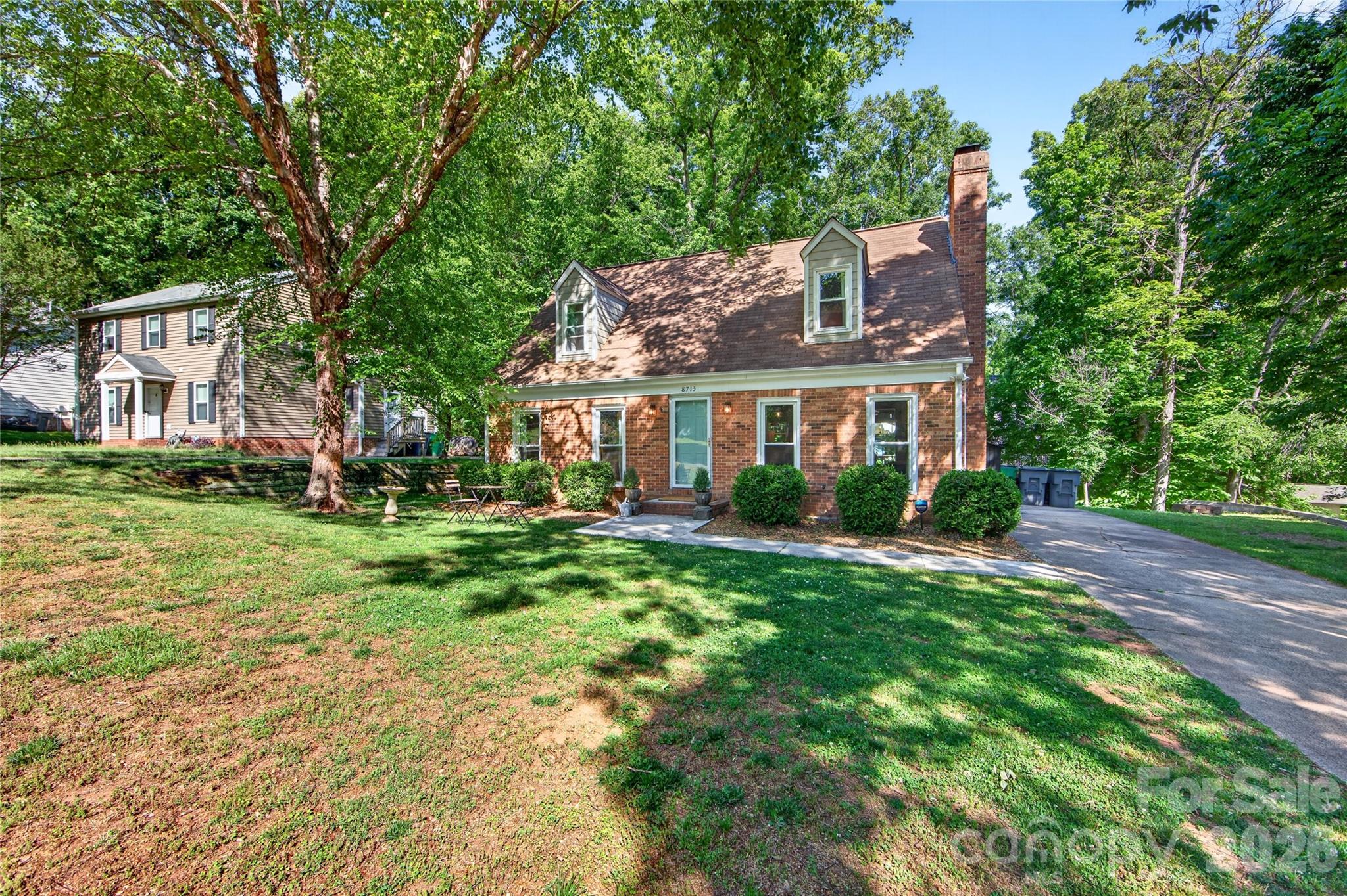 8713 Golf Ridge Drive Charlotte, NC 28277 - Photo 30 of 30 a front view of a house with a yard