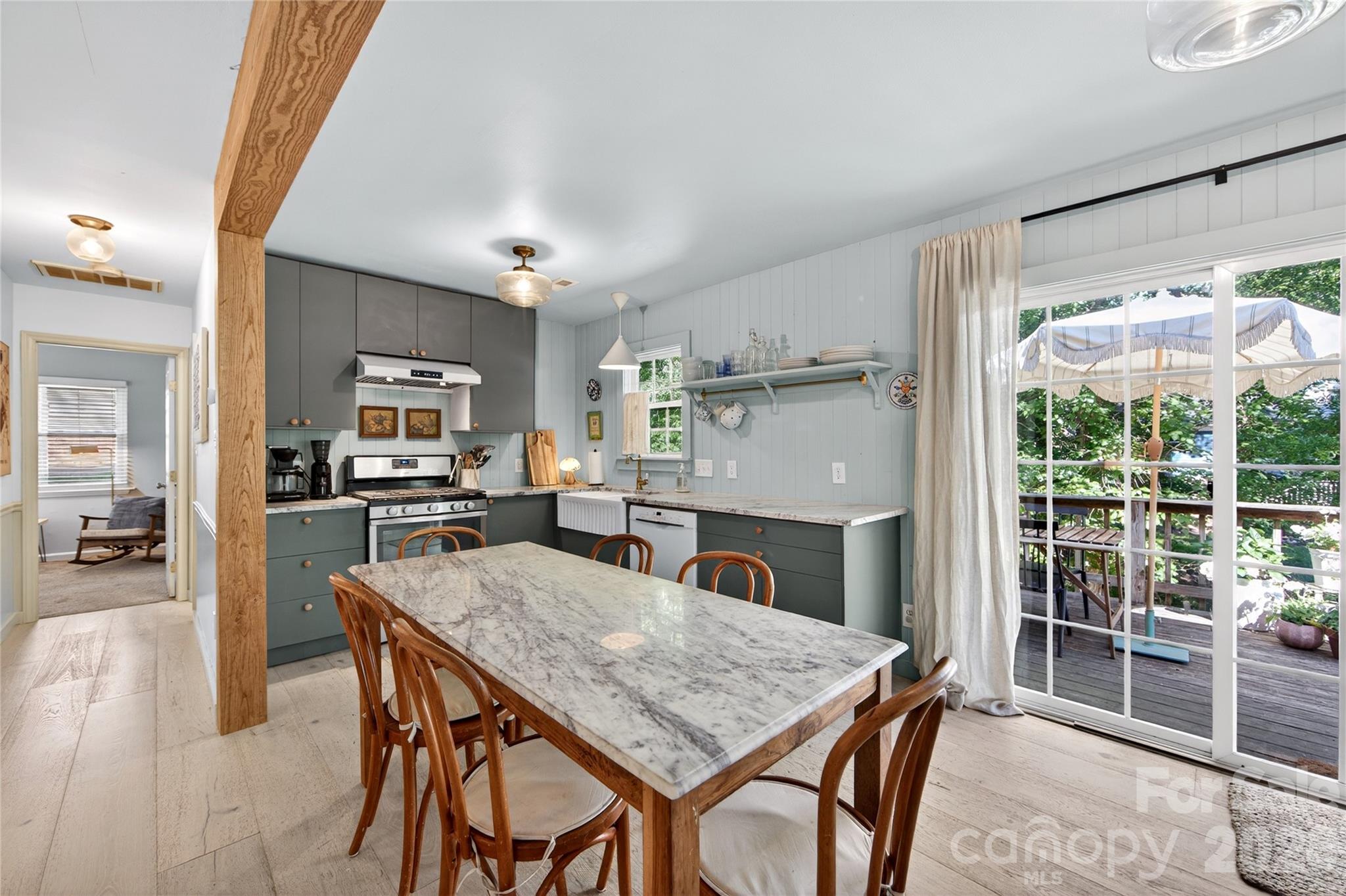 8713 Golf Ridge Drive Charlotte, NC 28277 - Photo 7 of 30 a kitchen with a table and chairs in it