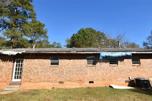 a front view of a house with yard