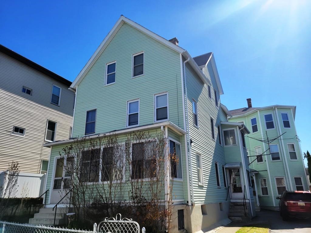 73 1/2 Esther Street, Unit 3 Worcester, MA 01607 - Photo 21 of 22 a view of a large white building