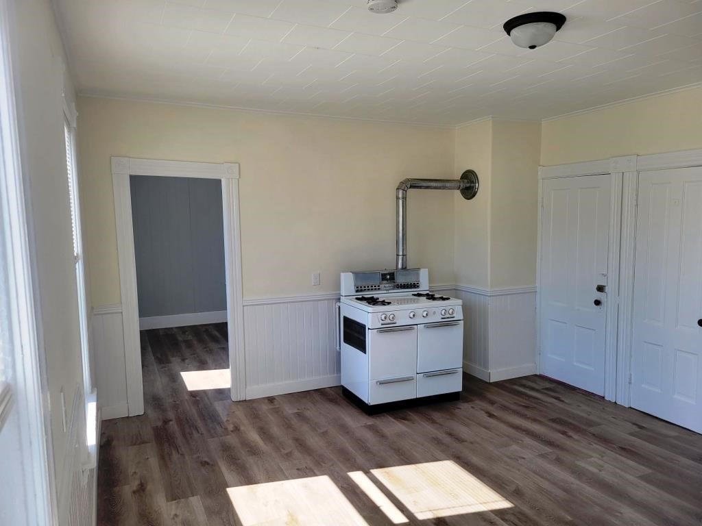 73 1/2 Esther Street, Unit 3 Worcester, MA 01607 - Photo 5 of 22 a view of room with wooden floor