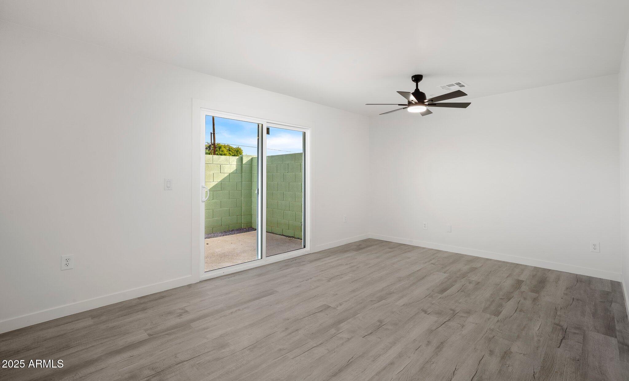 3114 North 68th Street, Unit 2 Scottsdale, AZ 85251 - Photo 14 of 25 a view of an empty room with a window
