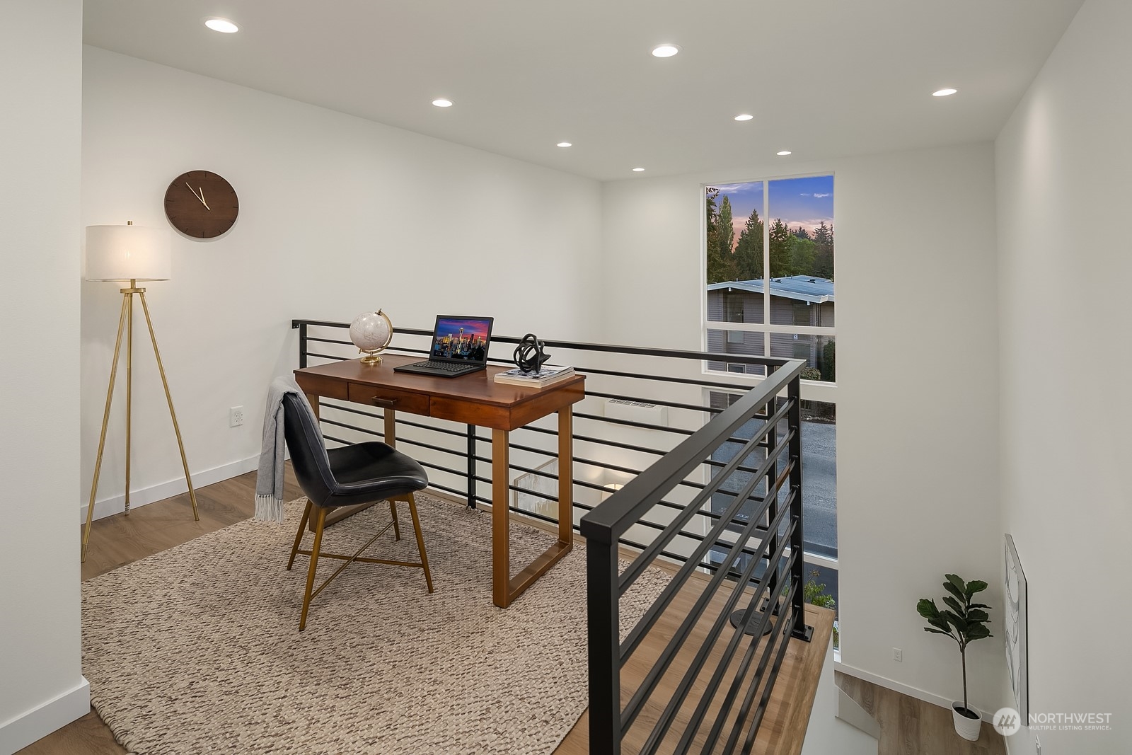3112 Northeast 120th Street Seattle, WA 98125 - Photo 12 of 26 a view of a workspace with furniture
