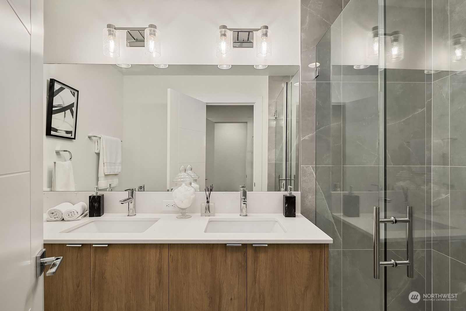 3112 Northeast 120th Street Seattle, WA 98125 - Photo 15 of 26 a bathroom with a sink and a mirror