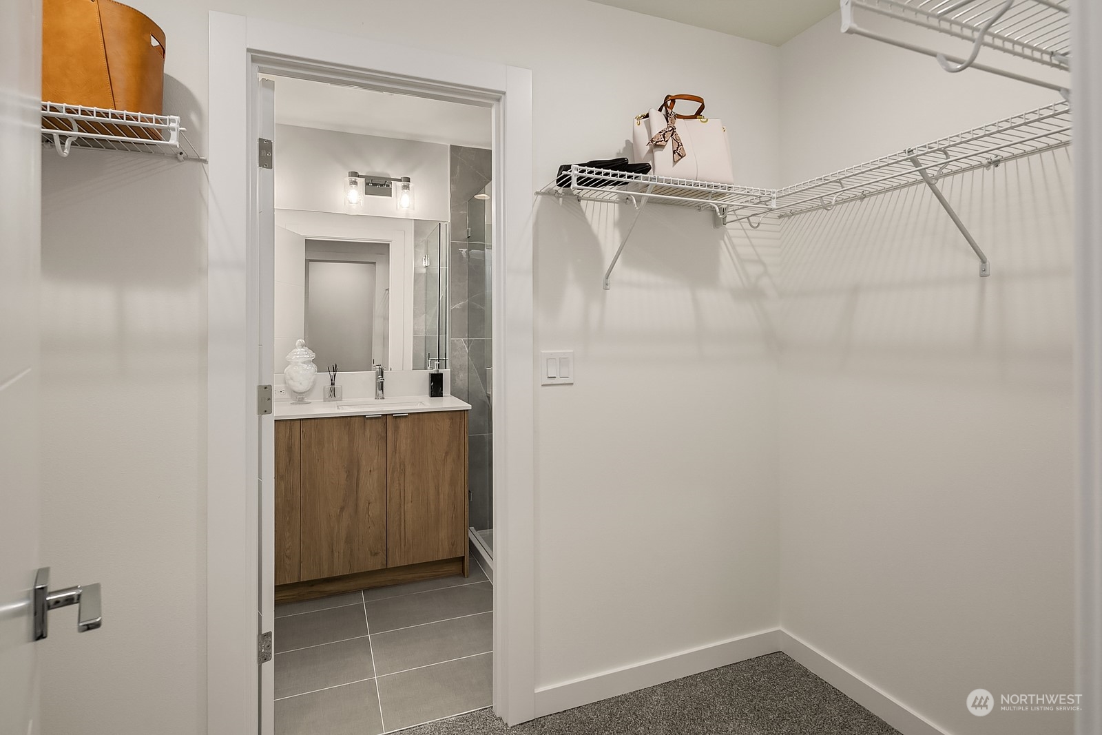 3112 Northeast 120th Street Seattle, WA 98125 - Photo 17 of 26 a bathroom with a sink and mirror