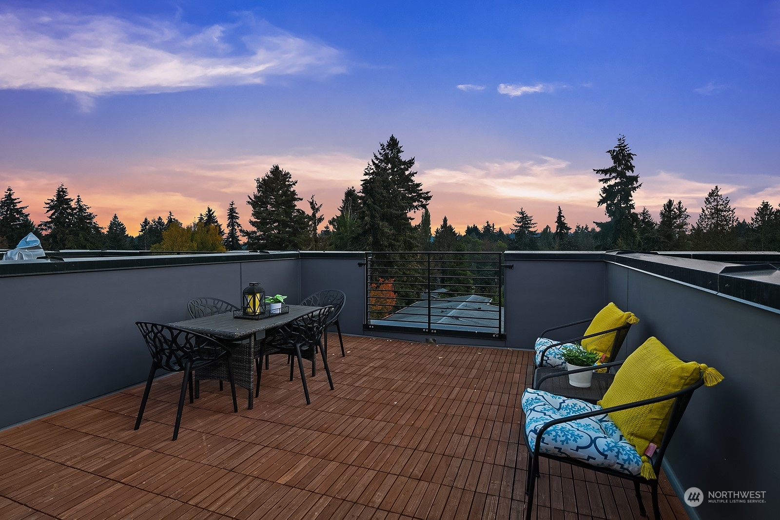 3112 Northeast 120th Street Seattle, WA 98125 - Photo 21 of 26 a view of a chairs and table on the terrace