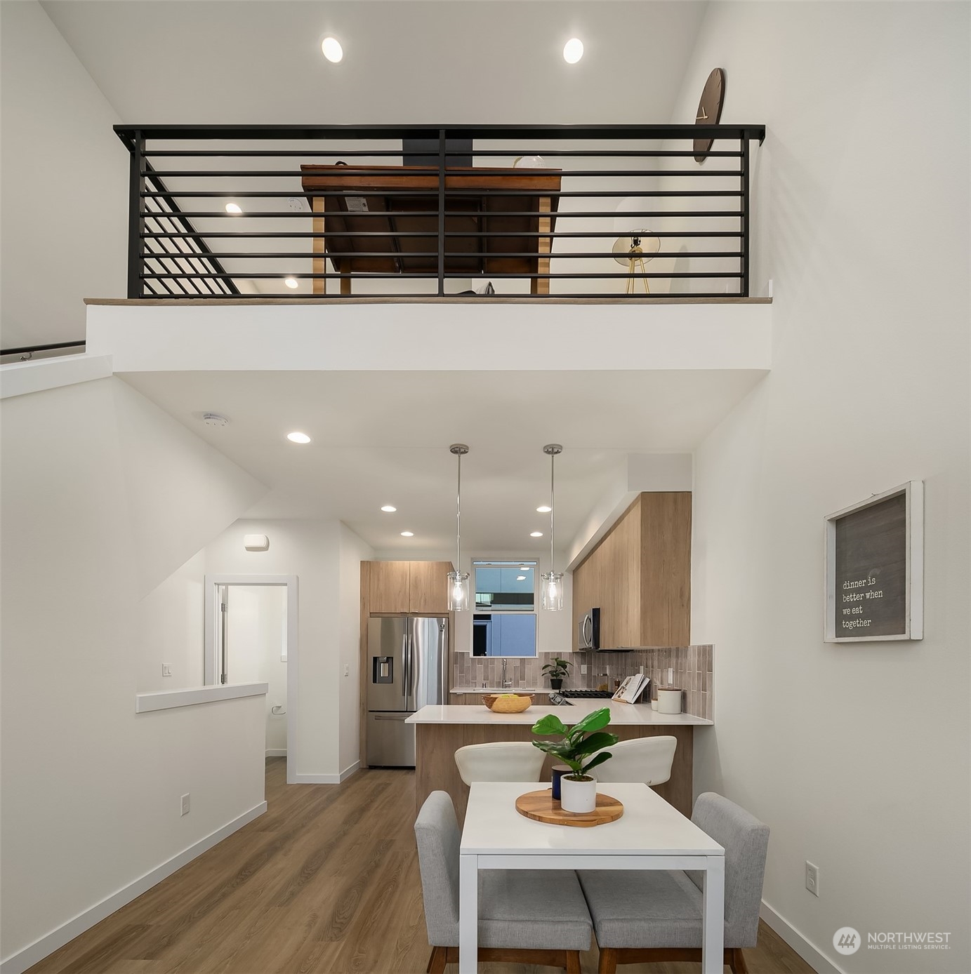 3112 Northeast 120th Street Seattle, WA 98125 - Photo 7 of 26 a kitchen with a table and chairs in it