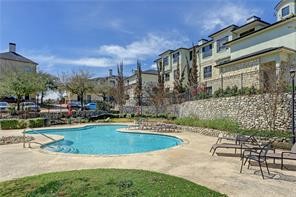 7701 Rialto Boulevard, Unit 1117 Austin, TX 78735 - Photo 1 of 1 a view of a swimming pool with a patio