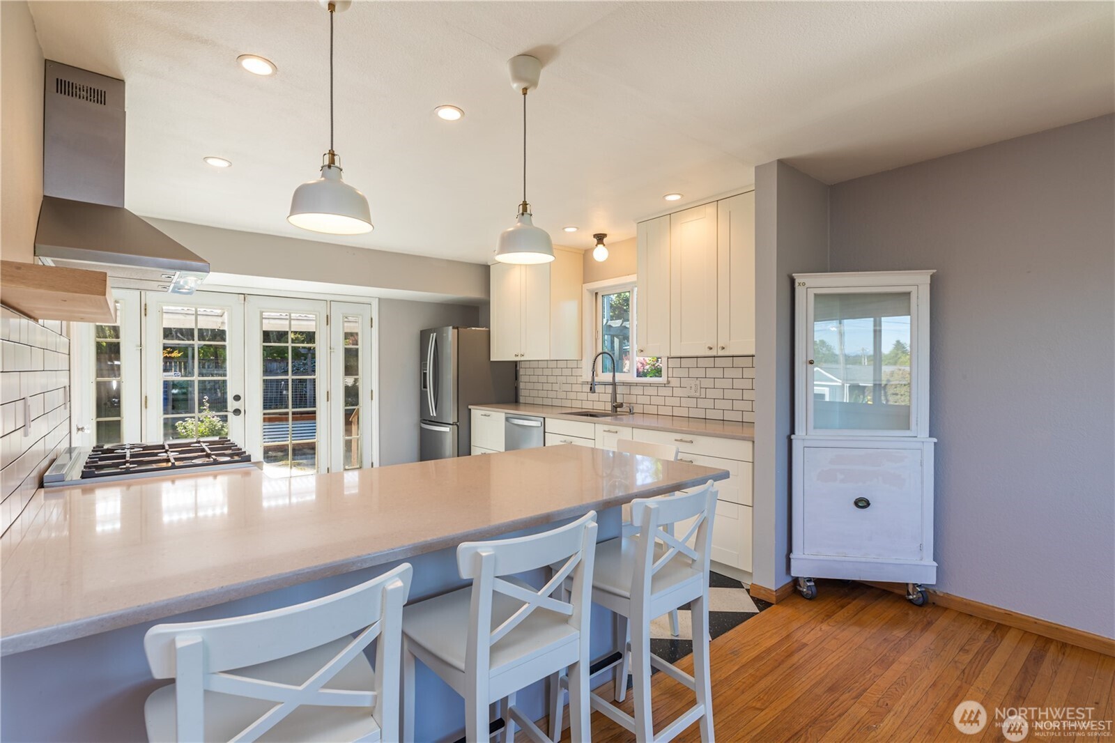 8601 36th Avenue Southwest Seattle, WA 98126 - Photo 8 of 28 a kitchen with a table and chairs in it