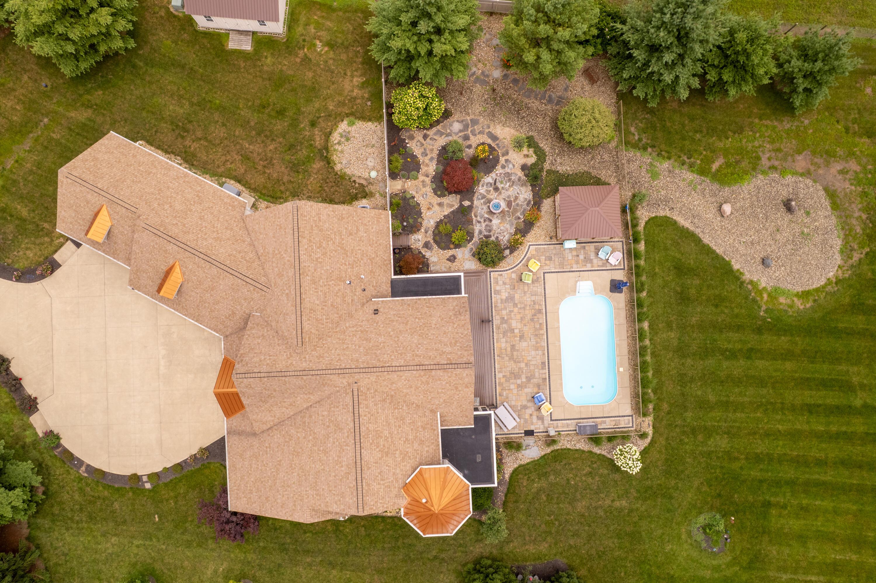 4640 Maynard Road Delaware, OH 43015 - Photo 4 of 91 Expansive outdoor space featuring a pool with surrounding paver patio, a covered gazebo, and established landscaping