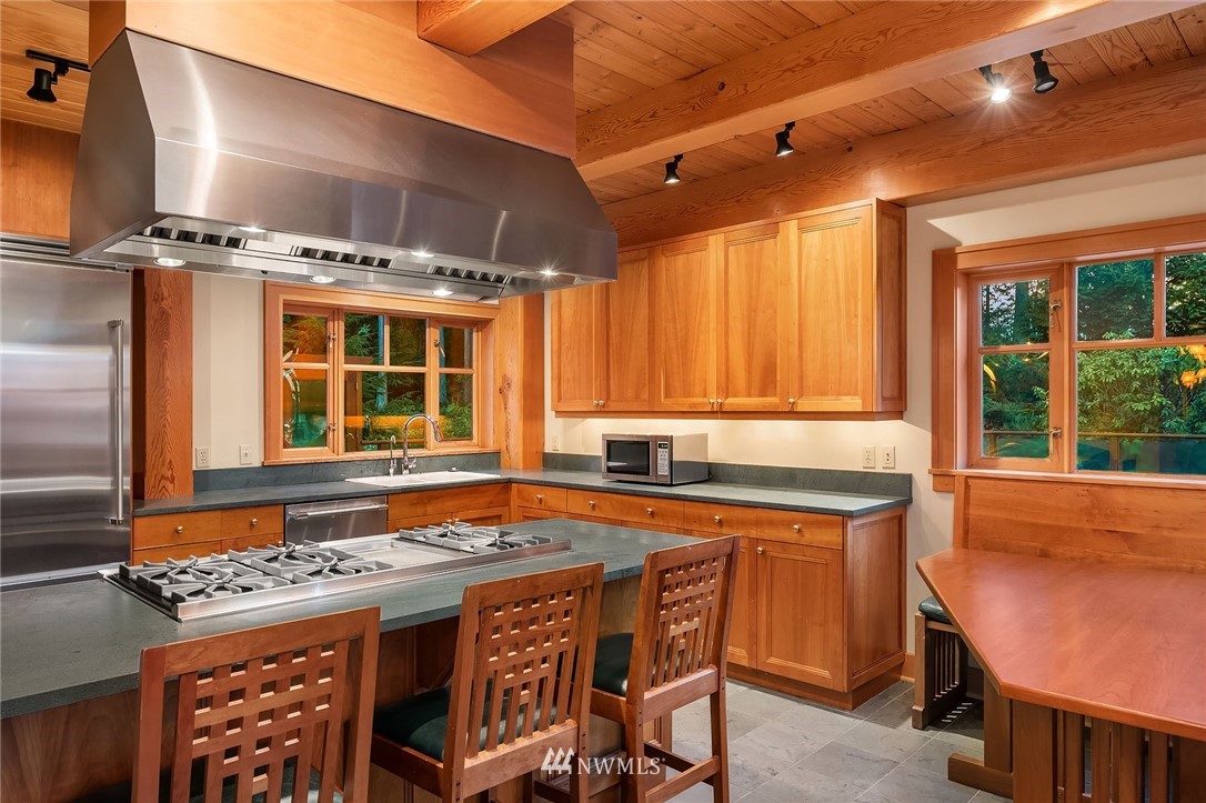 4129 Point Williams Place Bow, WA 98232 - Photo 22 of 40 a kitchen with a stove a sink and a refrigerator