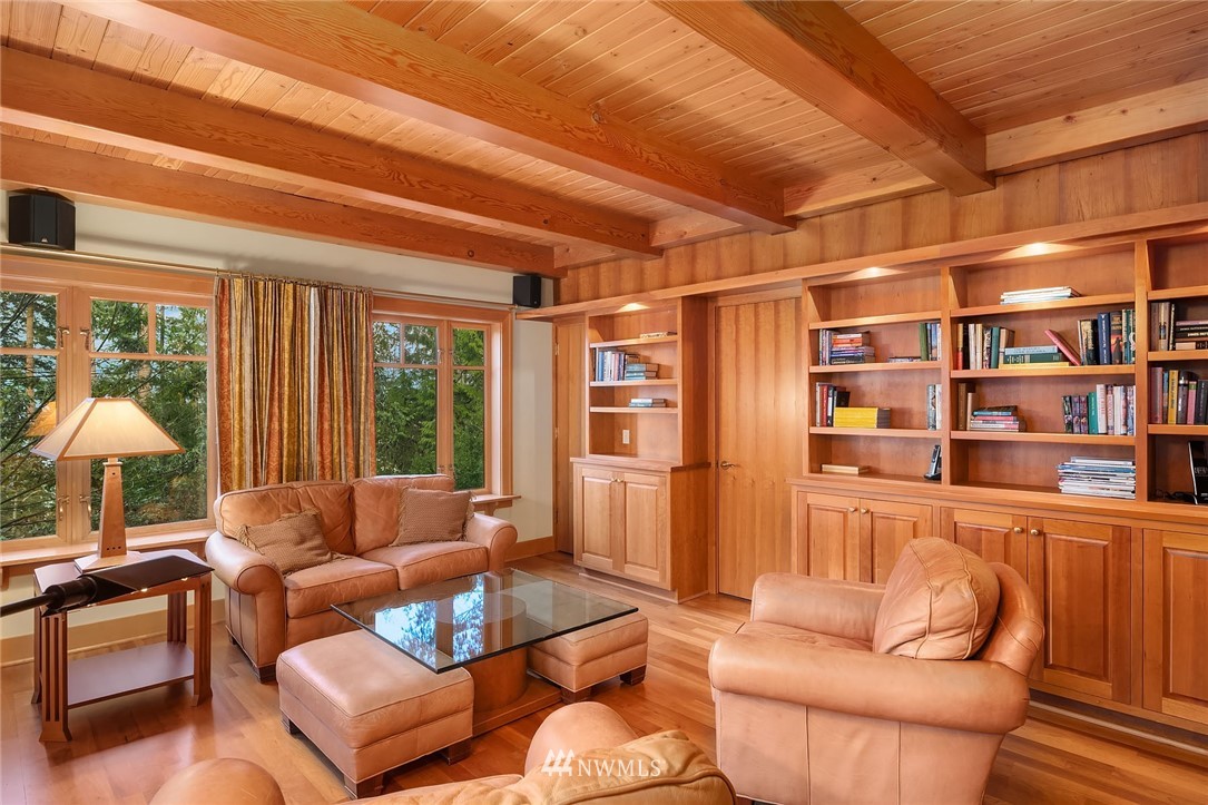 4129 Point Williams Place Bow, WA 98232 - Photo 23 of 40 a living room with furniture a large window and a flat screen tv
