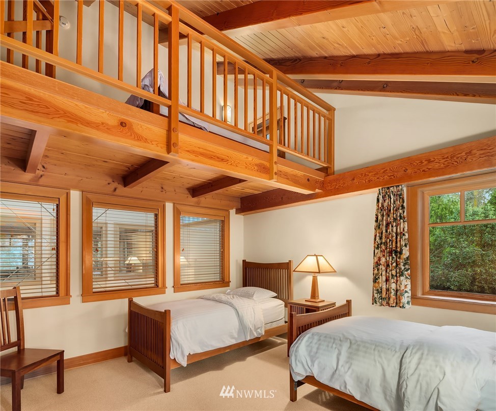 4129 Point Williams Place Bow, WA 98232 - Photo 33 of 40 a spacious bedroom with two beds and a window