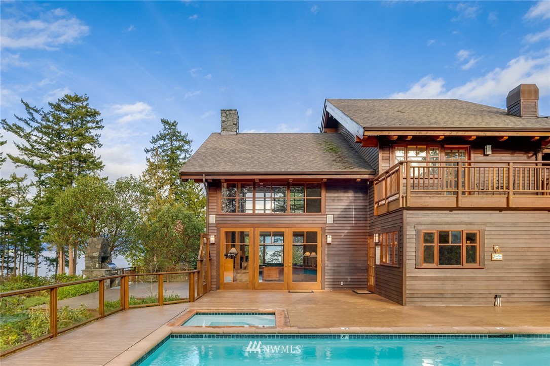 4129 Point Williams Place Bow, WA 98232 - Photo 6 of 40 a view of a house with wooden floor and a yard