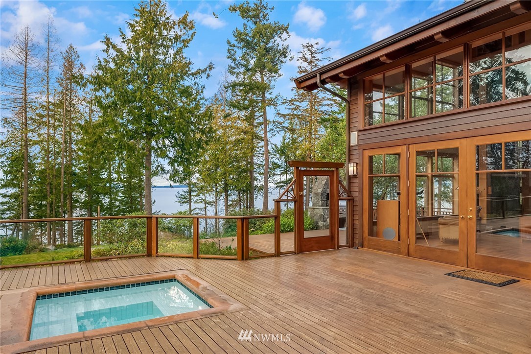 4129 Point Williams Place Bow, WA 98232 - Photo 9 of 40 a view of a house with a swimming pool