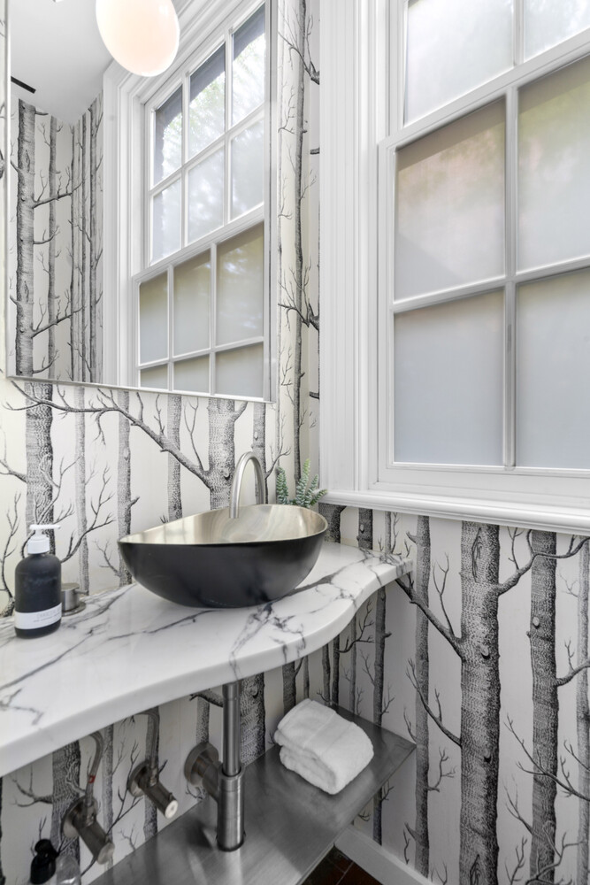 430 Hudson Street Manhattan, NY 10014 - Photo 17 of 35 a bathroom with a sink and a mirror