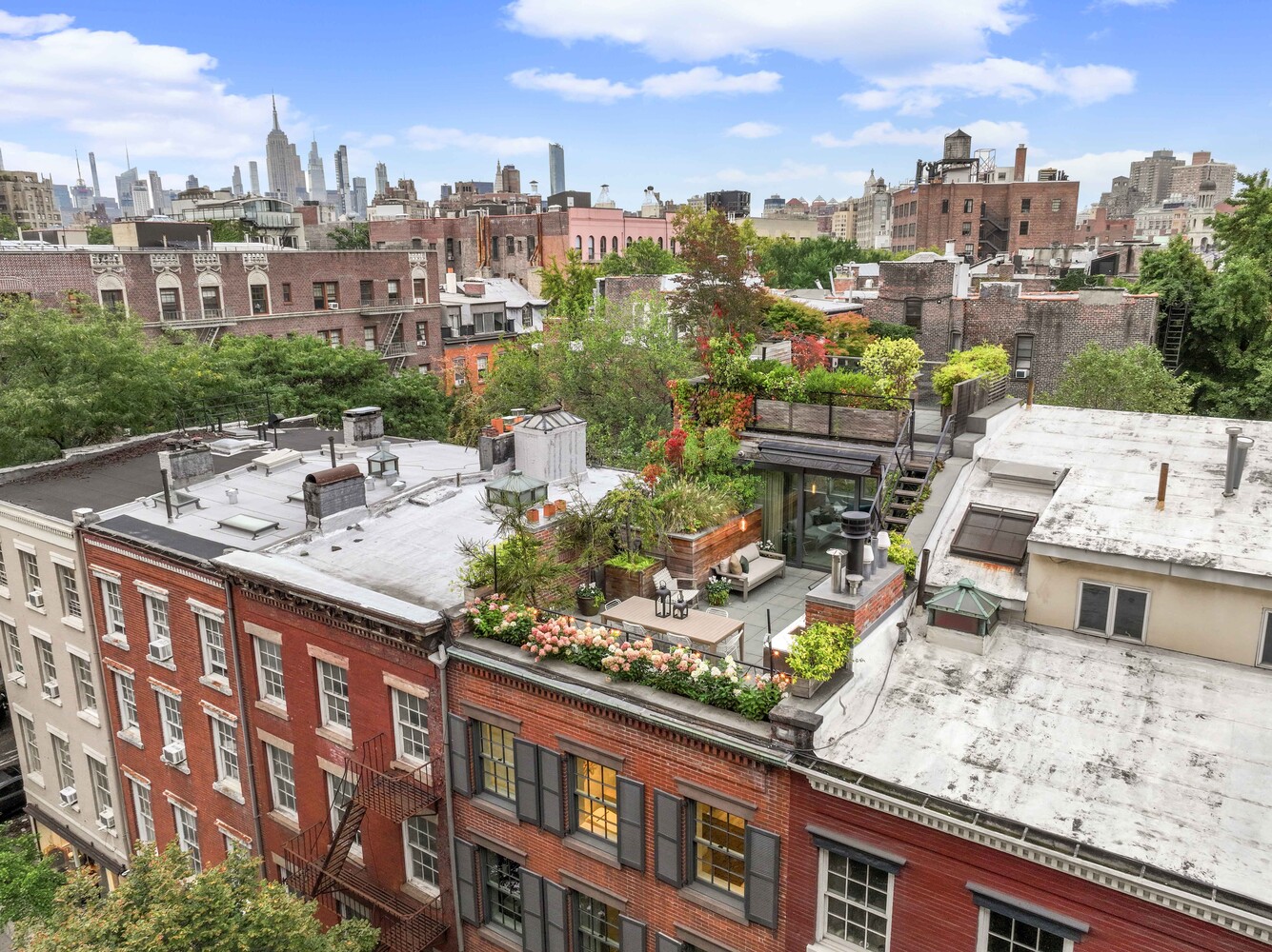430 Hudson Street Manhattan, NY 10014 - Photo 24 of 35 a view of a city from a terrace