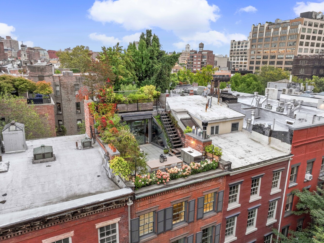 430 Hudson Street Manhattan, NY 10014 - Photo 28 of 35 a view of a city with tall buildings